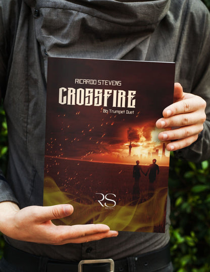 Person holding a duet book titled 'Crossfire' by Ricardo Stevens with a dark cover featuring two figures and flames.
